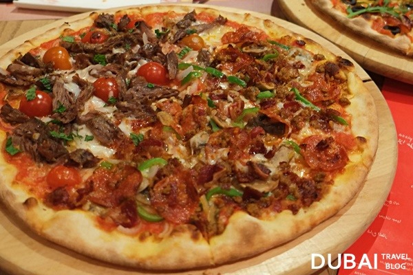 meat pizza itzza pizza dubai