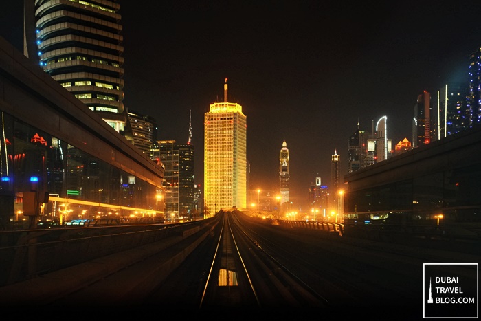 world trade center from dubai metro night shot