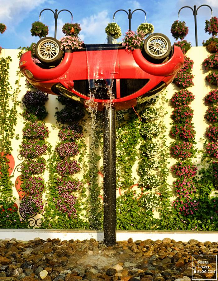 car-upside-down-fountain-miracle-garden_thumb