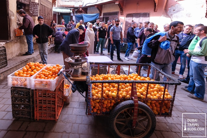 orange fruit vendor fez morocco