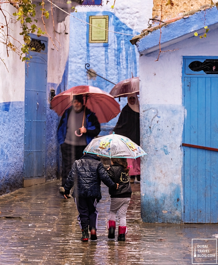 kids in morocco umbrella